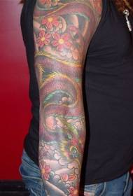 bras de fleur peint dragon et motif de tatouage floral
