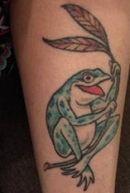 Vira tatuo de eŭropa bovido sur bildo de tatuaje de planto kaj rano