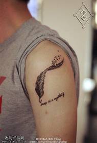 arm thorns feather feather tattoo pattern