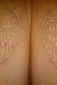 pasangan pergelangan tangan yang indah sayap tato darah merpati