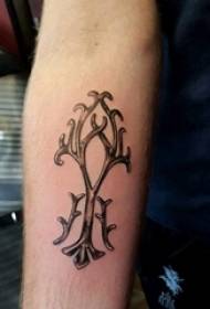 Koululaisen käsivarsi mustalla pisteellä piikki yksinkertainen abstrakti linja kasvi haara tatuointi kuvaa
