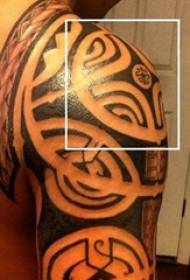 Schoolboy arm on black sketch creative geometric element tribal tattoo picture
