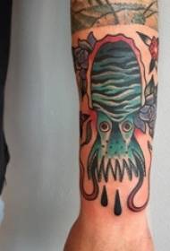 Tattoogeha piçûk a octopus wêneya tattooê ya rengîn a oktopus li ser milê nêr