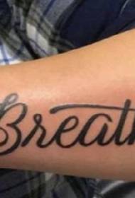 Mkono wa shule juu ya picha nyeusi laini ya picha ya tatoo la english