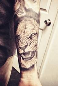 Mutilaren besoa puntu gris beltz arantza lerro abstraktu txiki animalia tigre tatuaje argazkia