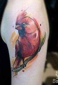 Schoolmeisje's arm geschilderd aquarel vogel tattoo foto