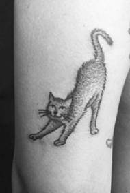 Boy's arm op zwart grijs punt doorn eenvoudige lijn kleine dieren kat tattoo foto
