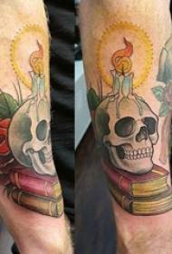 Boy's arm painted watercolor sketch domineering skull tattoo picture
