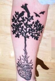 Foto di tatuaggi di albero di vita à e piante neru è biancu nantu à u bracciu