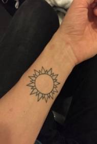 Boys arm on black line creative literary sun tattoo picture