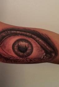 Immagine del tatuaggio dell'occhio di linea semplice geometrica della spina del punto grigio nero della spina