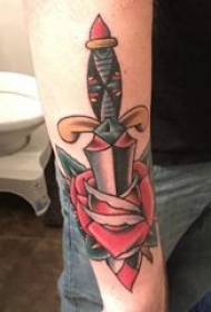 Dagger tattoo pattern, male arm, rose tattoo and dagger tattoo pattern