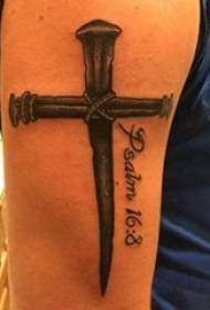 Tattoo malgranda kruca knabo brako sur nigra kruco tatuaje bildo