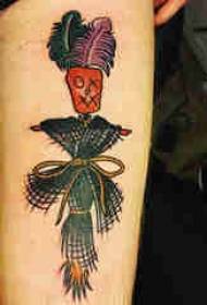 Ang tattoo sa Uropa sa Uropa nga lalaki shank nga kolor sa scarecrow tattoo nga litrato