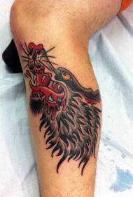 Immagine tatuaggio gamba lupo colorato vecchia scuola