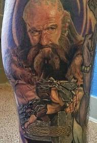 Imaxe da tatuaxe do enano de famosa película de cor de pernas