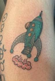 Ọmọ-akẹẹkọ akọ-ara ọmọ-ọwọ tatuu lori awọ Rocket Tattoo Aworan