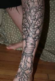 Leg black brown tree and tree root tattoo picture