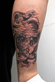 Patrón de tatuaje de calavera monstruo marrón pierna