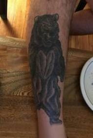 tatuaxe de oso macho macho becerro en foto tatuaxe de oso negro