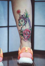 Tattoo picture of calf little horse with flowers