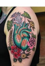 Färgskola tatuering bild på låret låret