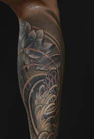 Black and white big squid tattoo for men's calf tribe