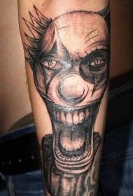 Modèle de tatouage de clown fou sur le mollet