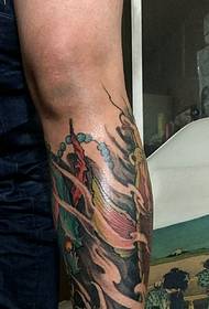 Vibrant calf gold carp tattoo