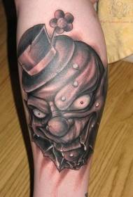 Clown tattoo qauv nrog txhais ceg thiab paj thiab lub kaus mom