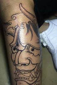 a simple tattoo on the calf