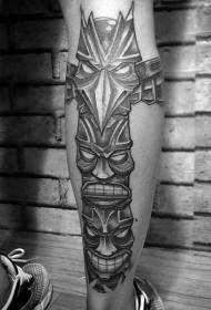 Modello tribale del tatuaggio della statua tribale del fumetto in bianco e nero della gamba