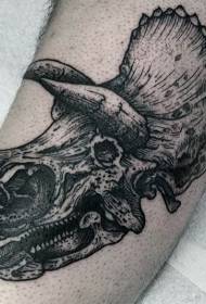 Isitayela se-tattoo emnyama ye-quirky dinosaur skull tattoo