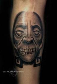 Kalf zwart grijs eng monster gezicht tattoo patroon