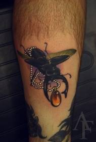 Kalf zwart insect met juweel tattoo patroon