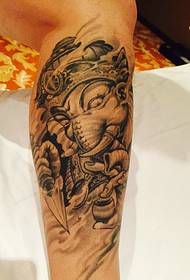 Modern black and white elephant god leg tattoo picture