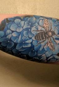 Tattoo pattern flowers, boy's arms, colored flowers and bee tattoo pictures