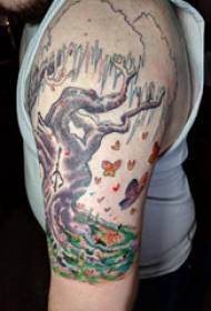 Tatuaje de ramo do brazo do neno sobre unha tatuaxe de rama de cores