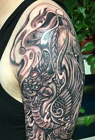 I tattoo enkulu yengalo squid engasokuze isuswe