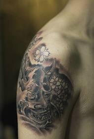 Grote zwart-witte kleine prajna-tatoeage-tatoeage is erg knap