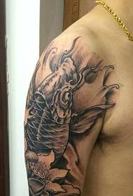 tattoo ປາມຶກໃຫຍ່ແຂນທີ່ສາມາດເຮັດໃຫ້ທ່ານໂຊກດີ