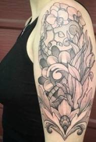 Girly grote arm op zwart grijs punt doorn eenvoudige abstracte lijn plant bloem tattoo foto