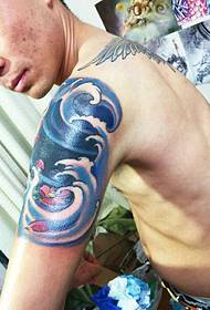 Cool big arm color small totem tattoo