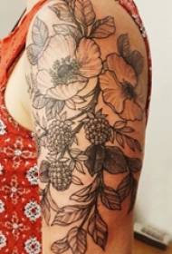 Minimalist tattoo boy's big arm on black plant tattoo picture