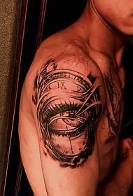 Tatuaggio tatuaggio braccio grande con orologio e bulbo oculare