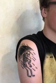 Brazo grande de los muchachos en paraguas de línea simple pinchado negro y foto de tatuaje