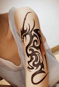 Pola tato tradisional totem booming klasik
