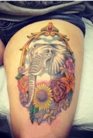 Elefánt tetoválás lány comb elefánt és virág tetoválás kép
