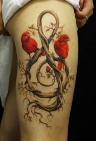 Thigh black bird and treble vine tattoo pattern