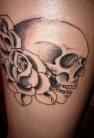 Simple black skull with rose thigh tattoo pattern